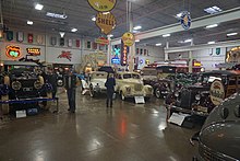 Group of cars in a large garage