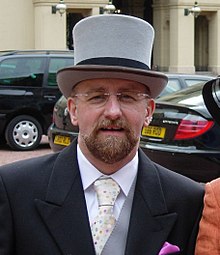 Stephen Whittle (OBE) at Buckingham Palace (cropped).jpg