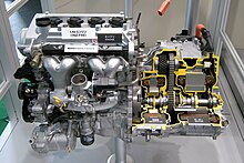 Toyota 1NZ-FXE engine (left) with early HSD, sectioned and highlighted (right). Generation 1/Generation 2, chained, ICE-MG1-MG2 Power Split Device HSD is shown. Toyota 1NZ-FXE Engine 01.JPG