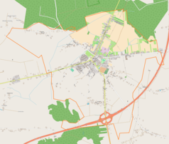 Mapa konturowa Złoczewa, blisko centrum na prawo znajduje się punkt z opisem „Parki Złoczewskie”