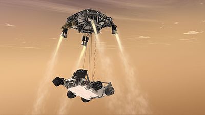 Artist's conception of Curiosity being lowered from the rocket-powered descent stage.