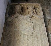Effigial slab for Sir William de Bayous (d. c. 1327) and his wife. Church of St Stephen, Careby, Lincolnshire, England[71]