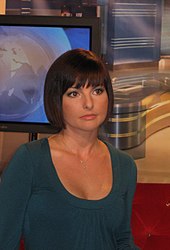 A news anchor going live on TV in Poland Beata Chmielowska-Olech beax.jpg