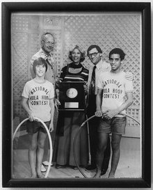 Ed Headrick promoting the Hula Hoop for Wham-O with celebrity Dinah Shore, two competitors and show host.