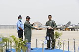 IAF Chief ACM RKS Bhaduria handing over ceremonial key to SQ 18 CO Manish Tolani.