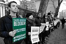 A protest outside the Saudi Arabian Embassy in London, 13 January 2017 London protest against Saudi Arabia's detention and flogging of prisoner of conscience Raif Badawi.jpg