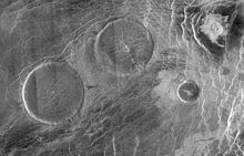 Radar mosaic of two 65 km (40 mi) wide (and less than 1 km (0.62 mi) high) pancake domes in Venus's Eistla region PIA00084 Eistla region pancake volcanoes.jpg