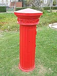 This pillar box, as situated above, belongs to one of the earliest documented British made post boxes, the fluted type supplied in 1857. This was one of 19 distinct types of pillar boxes supplied to the British post office in the period, 1852 to 1859. Type of site: Post Box, Railway Station. This pillar box, belongs to one of the earliest documented British made post boxes, the fluted type supplied in 1857.