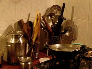English: Pots, pans and rolling pins : a scene...
