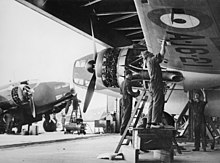 Lockheed Hudson aircraft of No. 1 Squadron under assembly at RAAF Station Richmond. The Hudson in the right foreground was flown by Flt Lt John Lockwood, who led the first Allied attack against the Japanese. He and his wingmen damaged the Japanese freighter, Awazisan Maru, forcing its abandonment. RAAF Hudson.jpg