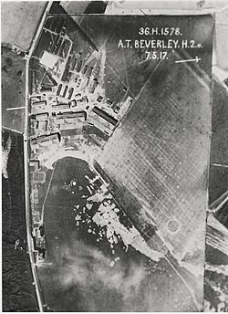 A black and white vertical aerial image of the airfield hangars, taken in 1917