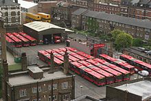 London General's Red Arrow articulated bus fleet at Waterloo garage in June 2006 Waterloo Bus Garage Red Arrows.jpg