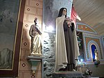 Statues de saint Joseph et de sainte Thérèse de Lisieux.