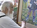 Francisco Brennand pintando quadro em seu ateliê