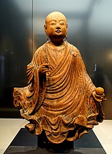 Bodhisattva sur un nuage (bois, couleurs, daté 1053, fin de l'époque de Heian, musée national de Tokyo).