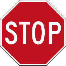 A stop sign is an example of semiotics in everyday life. Drivers understand that the sign means they must stop. Stop signs exist in a larger context of road signs, all with different meanings, designed for traffic safety. Canada Stop sign.svg