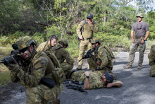 Australian Clearance Diving Team One conduct direct-action tactical manoeuvring during HYDRACRAB Clearance Diving Team 1 - HYDRACRAB 2019.png