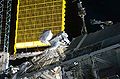 Missionens første rumvandring, rensning af Solar Alpha Rotary Joint (SARJ) på rumstationens solpaneler.