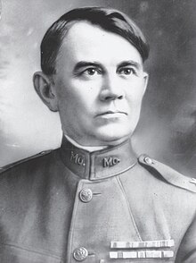 Black and white reproduction of head and shoulders portrait of Brigadier General Harvey C. Clark in dress uniform