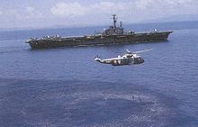 Aircraft carrier INS Vikrant during the Indo-Pakistani War of 1971. The ship played a crucial role in enforcing the naval blockade on East Pakistan and ensuring India's victory during the war. INS Vikrant (R11) with a Sea King helicopter during Indo-Pakistani war of 1971.jpg