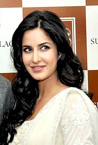 Katrina smiling and looking away from the camera