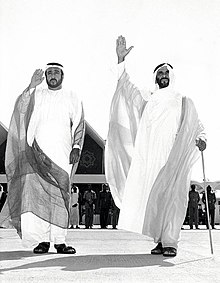 Sheikh Zayed next to his son Sheikh Khalifa Khalifa and Zayed Al Nahyan.jpg