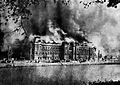Image 23The Metropolitan Police Department burning at Marunouchi, near Hibiya Park during the 1923 earthquake (from History of Tokyo)