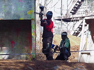 Paintball players in mid-game