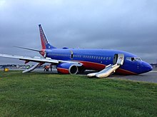 Southwest Flight 345 after nose-first crash landing on RWY 4 at LaGuardia 22 July 2013.jpg