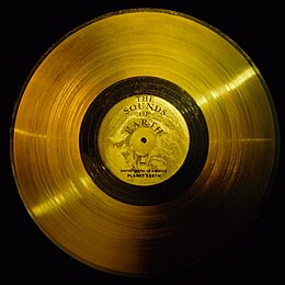 Grooved side of the Voyager Golden Record launched along the Voyager probes to space, which feature music from around the world The Sounds of Earth - GPN-2000-001976.jpg