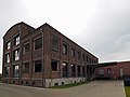 ehemaliges Industriegebäude der Destillerie, Likör-, Essigsprit-Fabrik und Weinkellerei Helgers & Cie.