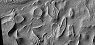 Hollows on floor of Reull Vallis, as seen by HiRISE under HiWish program