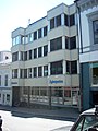 Agderpostenin rakennus Østregatella Arendalin keskustassa.