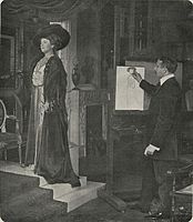 Malíř Antoon van Welie maluje zpěvačku Alys Lorraine (1909)