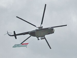 Apsny Flag With Helicopter.jpg