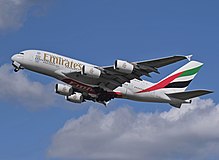 Ground to air photograph of an Emirates Airbus A380 departing London Heathrow Airport