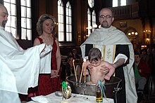 Baptism and Chrismation, the sacraments of initiation, in an Eastern Orthodox church GreekOrthodoxBaptism1.jpg