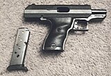 Hi-Point C380 pistol with the slide locked back