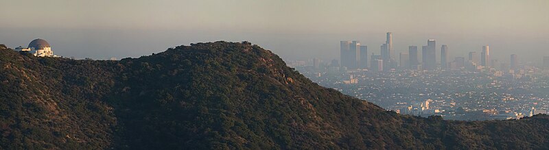 Downtown Los Angeles on a smoggy late afternoon with Griffith Observatory in the foreground at left.