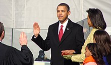 Barack and Michelle Obama, their children, and Chief Justice John Roberts