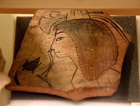 Frasco que mostra un mono rascando o nariz dunha nena. Dinastía XX. Da chamada Escola de Artistas de Ramesseum, Tebas, Exipto. O Petrie Museum of Egyptian Archaeology, Londres