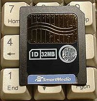 A 32MB SmartMedia flash memory card (on keyboard for scale)