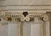 Ionic capitals of the fireplace of the Tornié hotel.