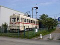 A small section of preserved track with train and signals