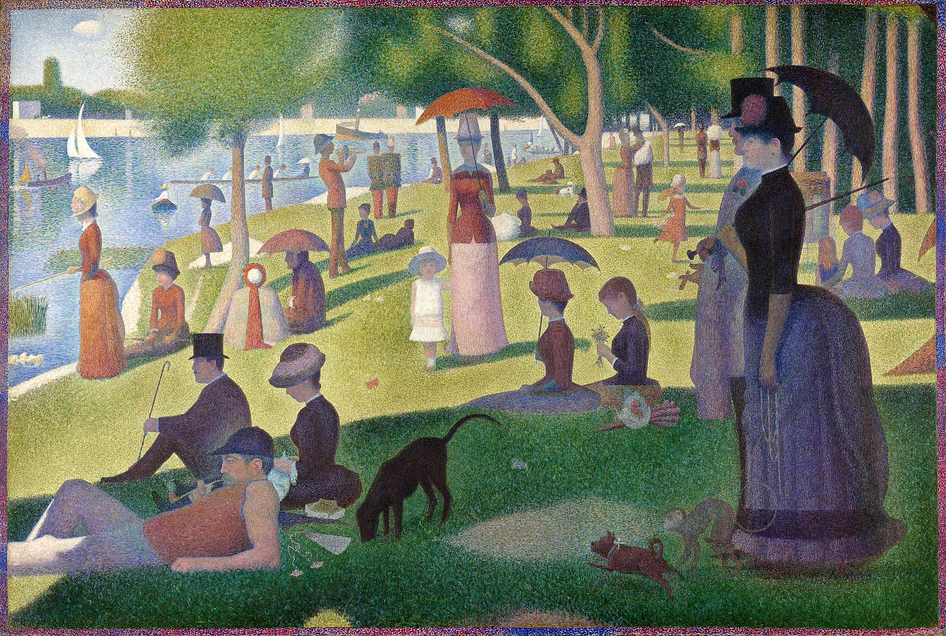 A painting in pointillism style. In the painting, people in 19th century clothing relax on the banks of a river. There are trees along the bank and sailboats in the water.