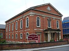 Bunyan Meeting Free Church, a Nonconformist chapel in Bedford. Dissenter John Bunyan purchased a barn in 1672 for a meeting place. A meeting house replaced it in 1707 and this chapel was built in 1850. Bunyan Meeting Free Church - geograph.org.uk - 809801.jpg