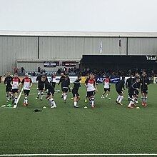 Photo of Dundalk F.C. 2019 squad warm-up before a match in Oriel Park