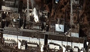 Fukushima I nuclear accidents: Satellite image taken on 16 March of the four damaged reactor buildings