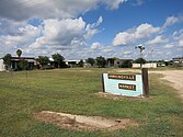 Hawkinsville Market sign is at the intersection of FM 457 and FM 2611 farther south.