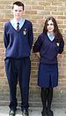 English: Two pupils wearing the uniform of Ken...